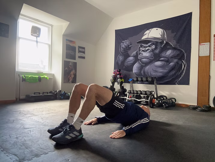 Glute bridge hold exercise for core and glute activation