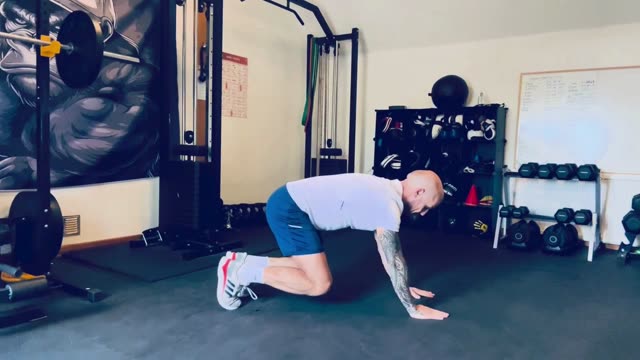 Bear crawl shoulder taps