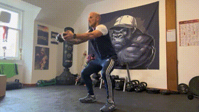 Dumbbell squat to front raise