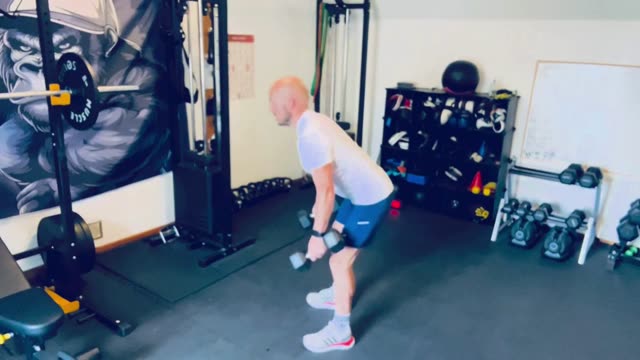 Dumbbell suitcase deadlift