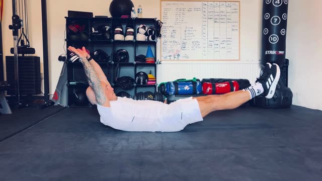 Hollow hold to V-sit